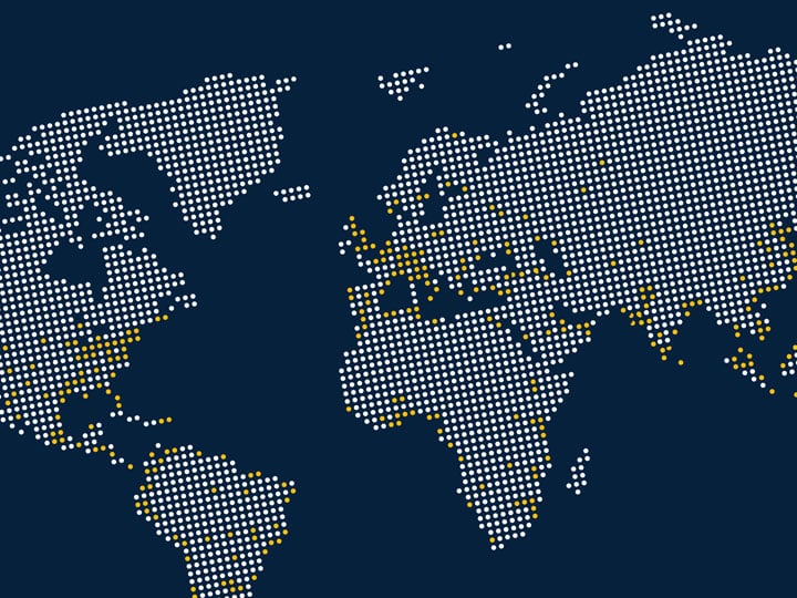 dotted world map with white and yellow dots