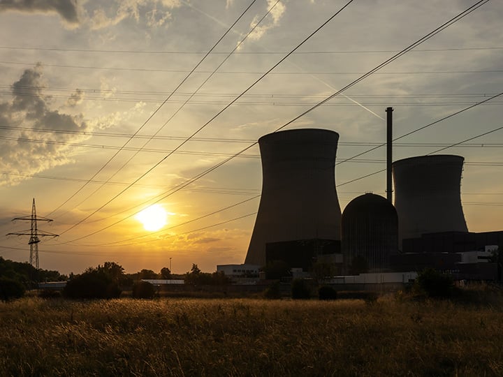 silhouette of nuclear towers at sunset