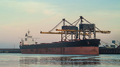 Cargo ship loading with coal in the Netherlands