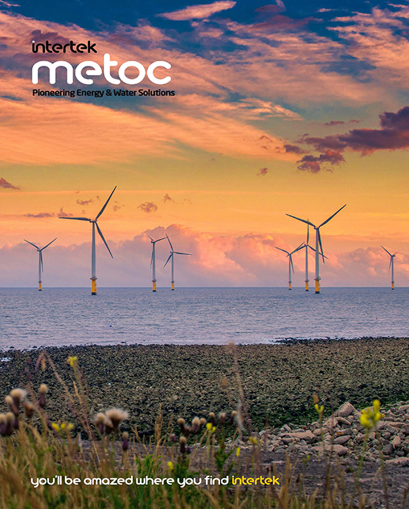 Small image of offshore wind farm with colorful sunset