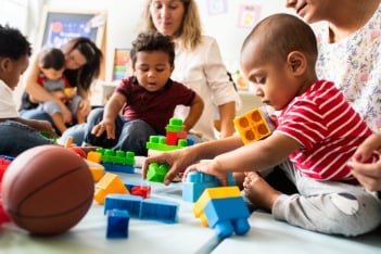 Diverse children enjoying playing with toys